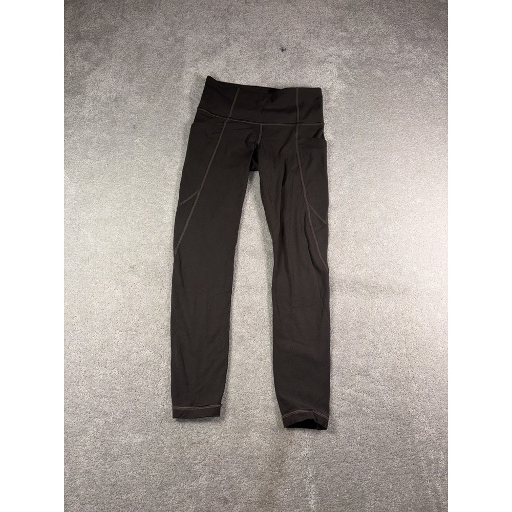 athleta stash pocket salutation tight xsp green